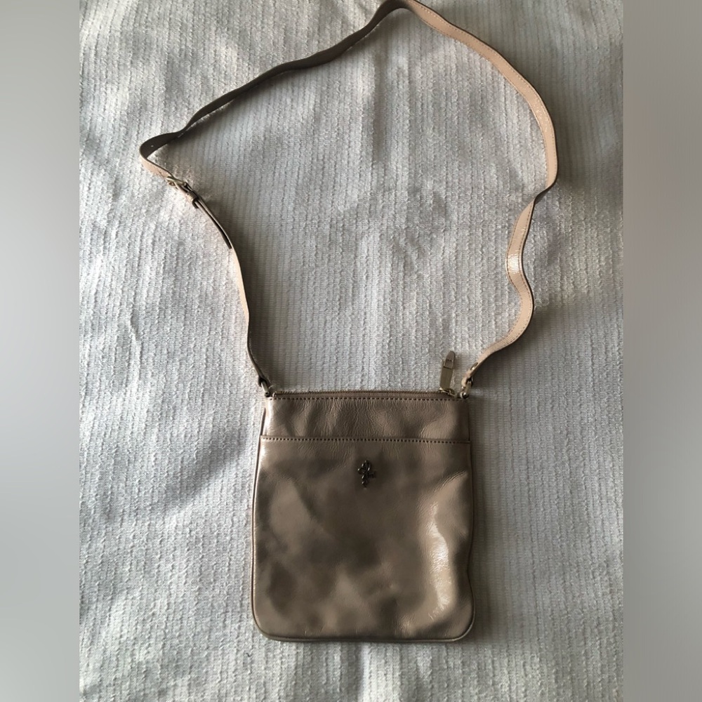 Cole Haan crossbody purse 
Color beige 
Very good condition